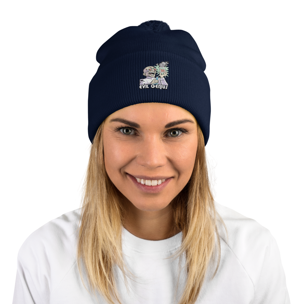Person wearing a navy beanie with a logo on a white background